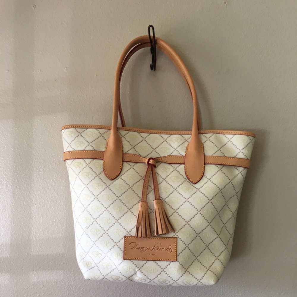 Large white Dooney & Bourke purse.
